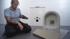 Montering af Triomont fikstur til væghængt wc.DK.mp4